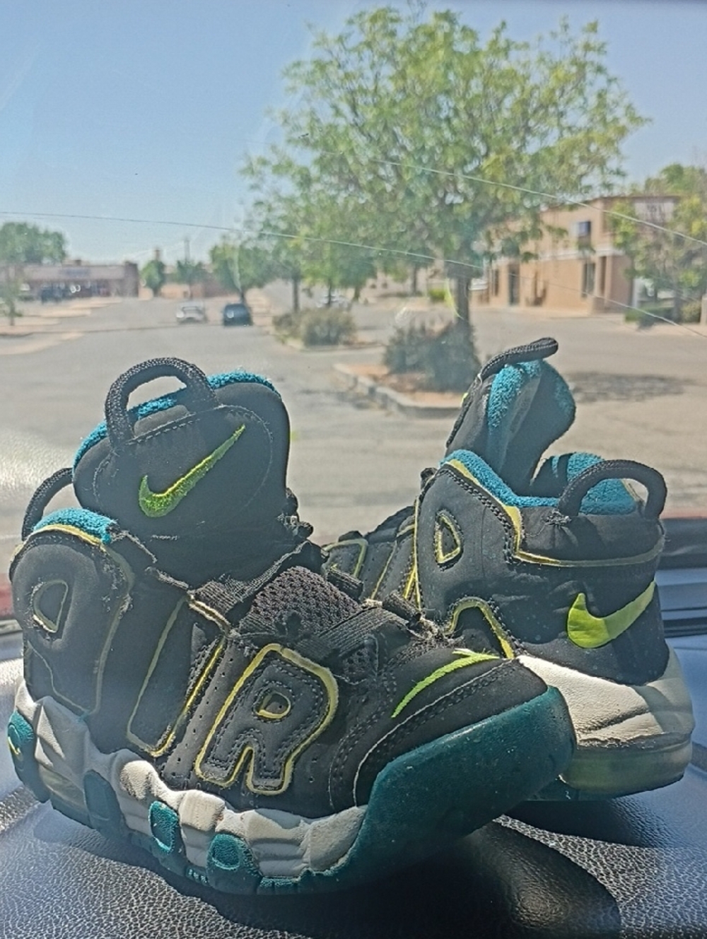 Nike Kids Black Sneakers with Teal and Lime Accents